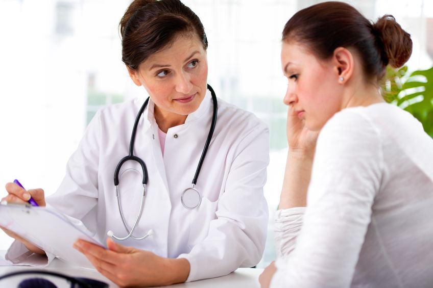 Female physician talking to a patient