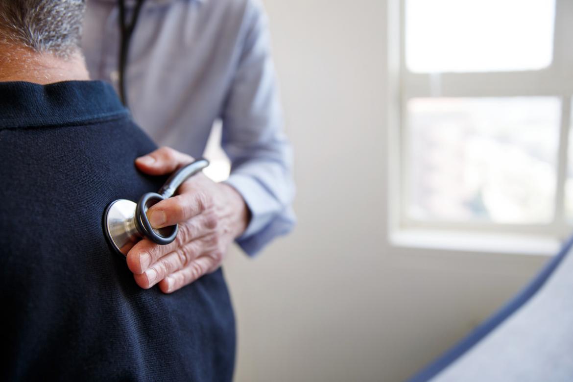 Doctor giving patient a checkup