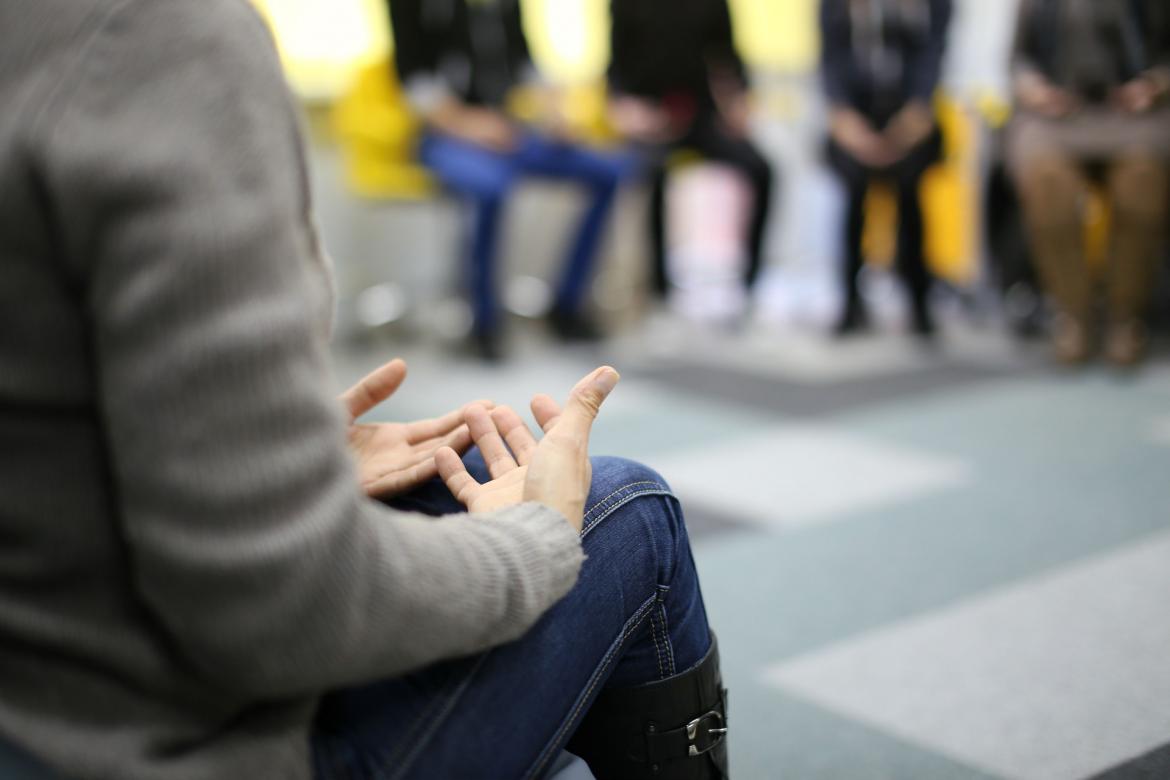 Person talking during group therapy session