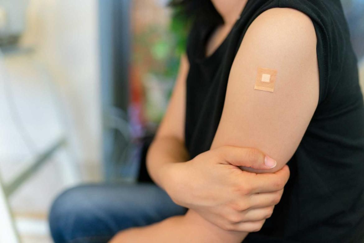photo of an arm with bandaid