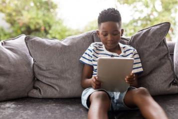 Child holding a table device